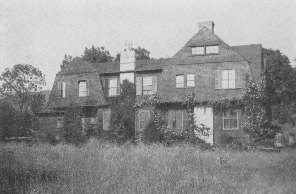 Shingled Home Adorned with Vines